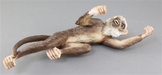 An unusual German porcelain figure of a climbing monkey, by Ernst Boehne & Sons, c.1887-1896, height 39cm